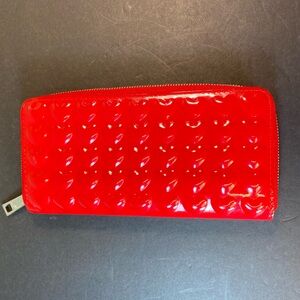 Red Embossed glossy zip around  EUC